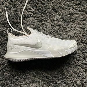 White Nike Vapor NXT shoes